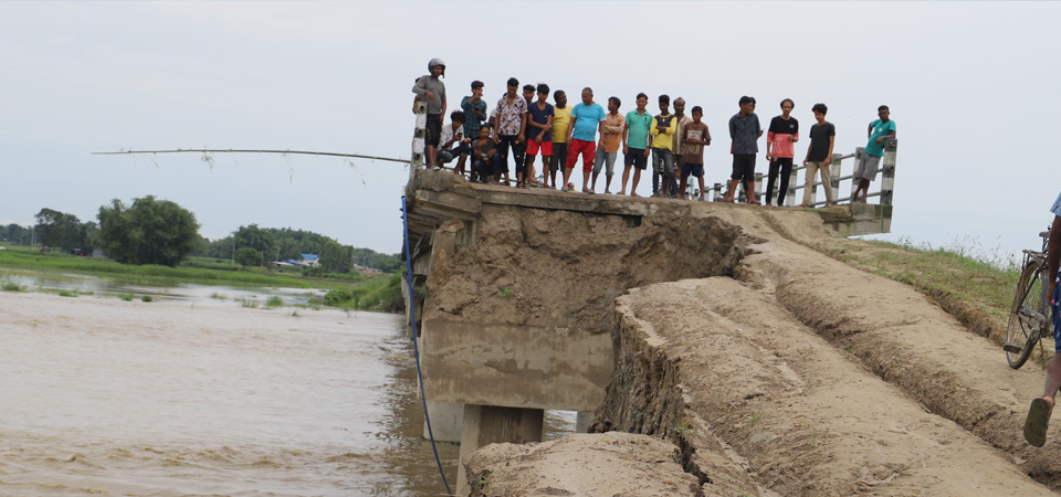 floods-wash-away-road-obstruct-movement