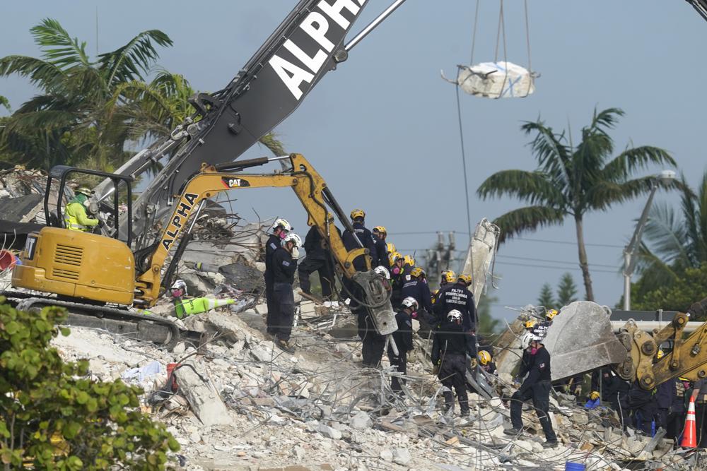 demolition-widens-search-at-condo-site-but-storms-threaten
