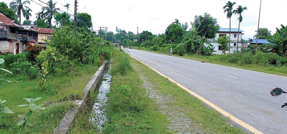 open-drains-preventing-residents-to-utilise-postal-road-in-morang