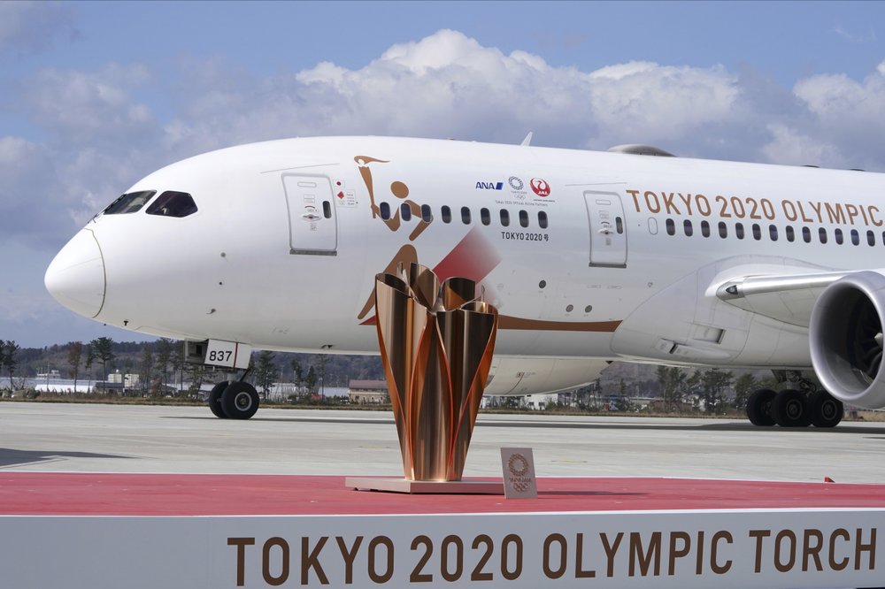 olympic-flame-lands-in-japan-as-doubts-grow-over-tokyo-games
