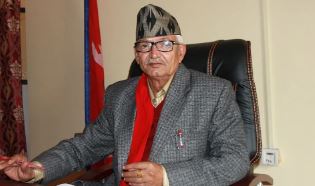 cm-poudel-congratulates-dr-jha-and-frontline-medical-workers