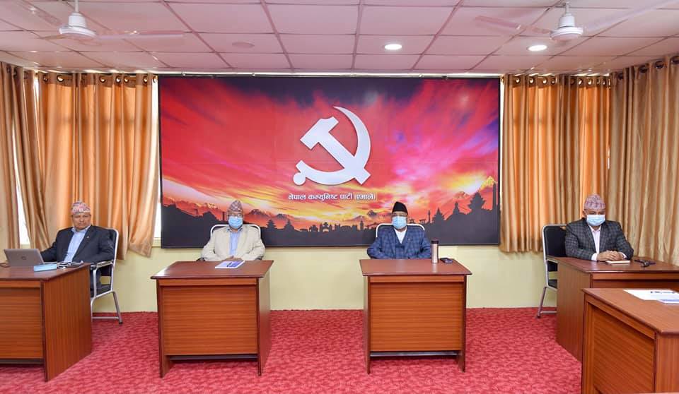 prime-minister-oli-and-leader-madhav-nepal-at-party-office-dhumbarahi