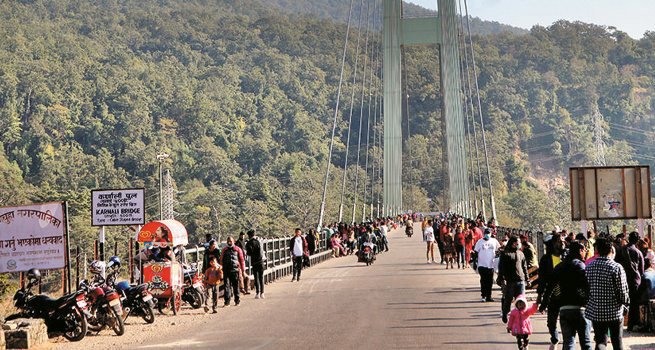 diving-into-karnali-from-bridge-two-rescued-one-still-missing