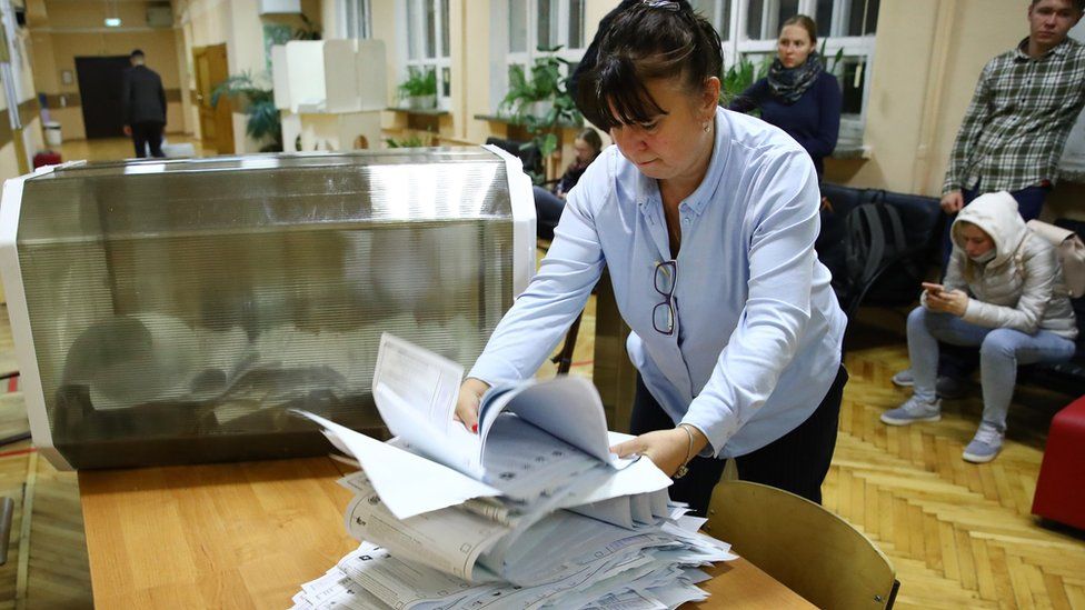 putins-party-leads-vote-amid-fraud-claims