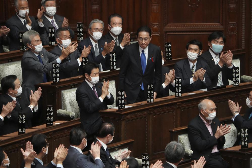 japans-parliament-elects-former-diplomat-kishida-as-new-pm