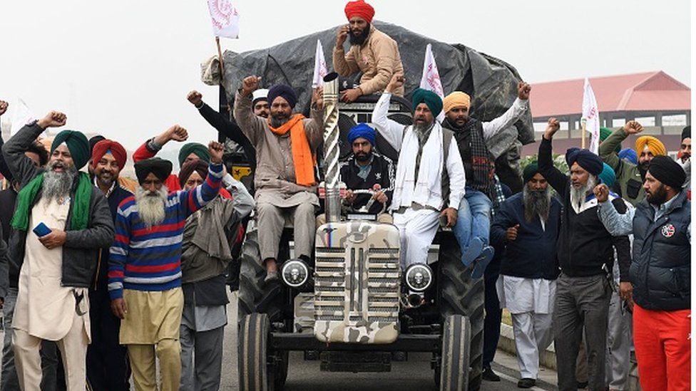 indias-farmers-end-year-of-mass-protests