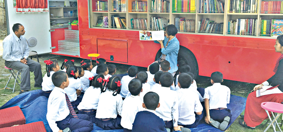 bus-rumbles-around-nepal-carrying-books-to-make-kids-creative