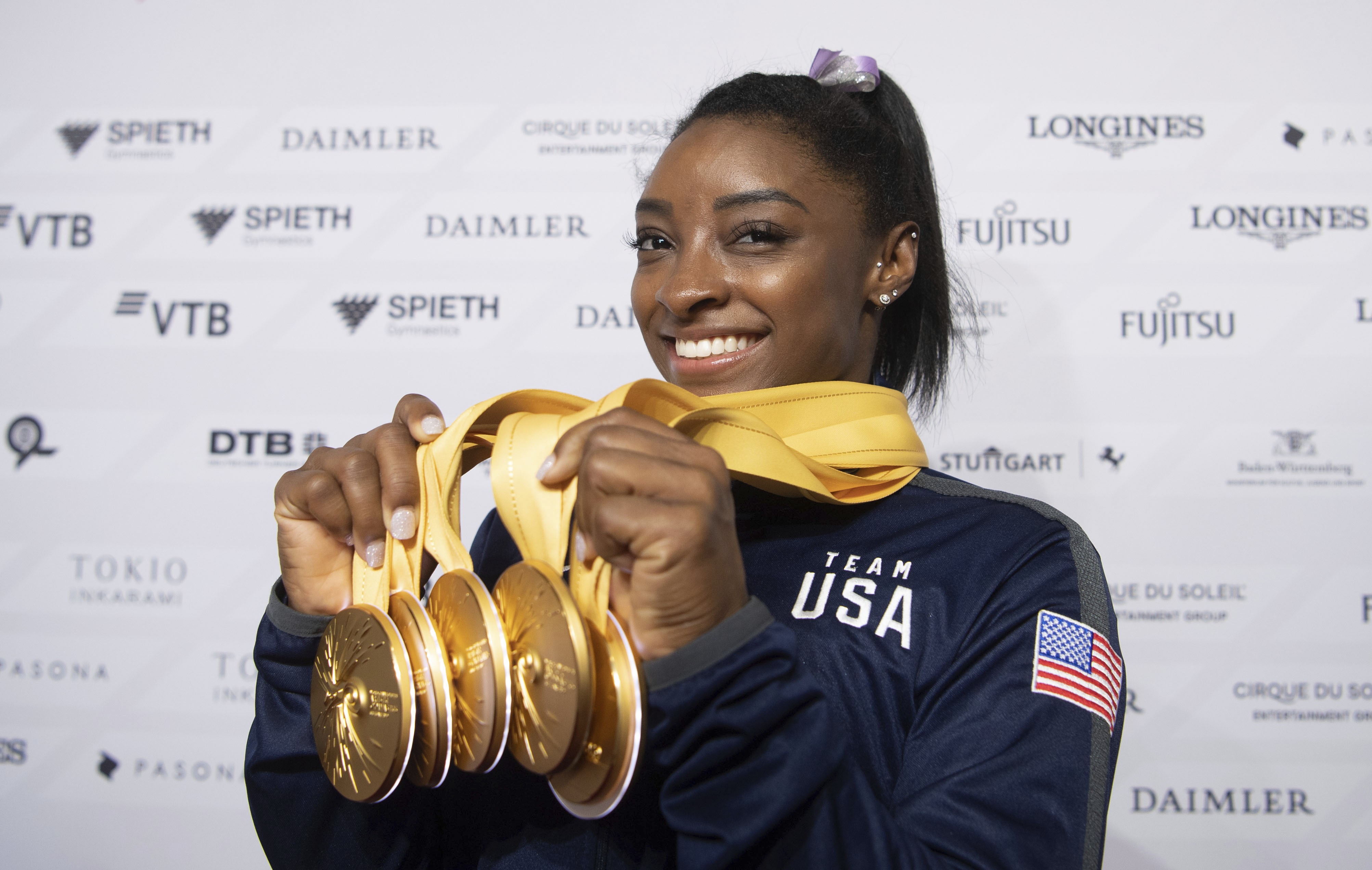 biles-hails-record-25-world-medals